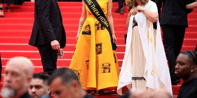 77e Festival de Cannes: survivante du massacre du 7 octobre en Israël, elle monte les marches avec une robe ornée des visages des otages