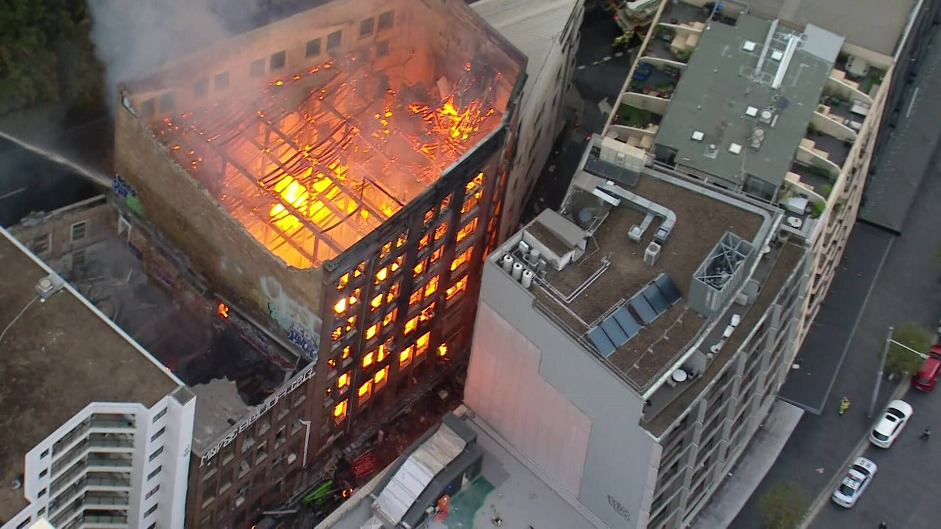 A seven-story building in Sydney, Australia has caught fire, and more than a hundred firefighters have been mobilized