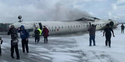 Les images incroyables de l'avion de Delta Airlines avec la carlingue est retournée sur le tarmac de l'aéroport de Toronto