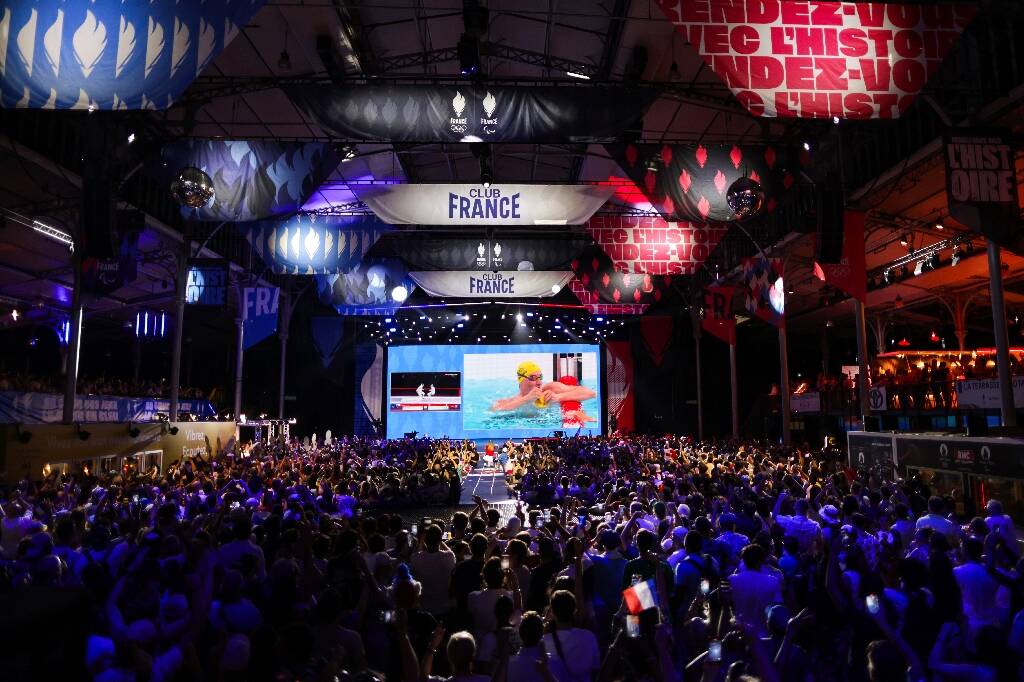JO-2024: sous le soleil, dans la file du Club France, pour sentir la "ferveur" olympique