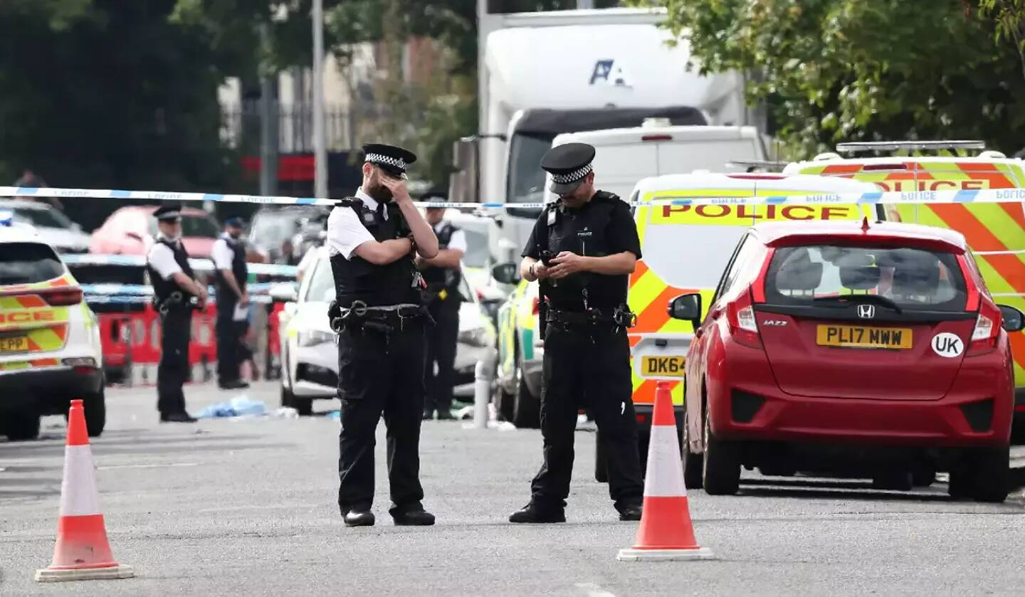 Des policiers sur les lieux d'une attaque au couteau à Southport, en Angleterre, le 29 juillet 2024.