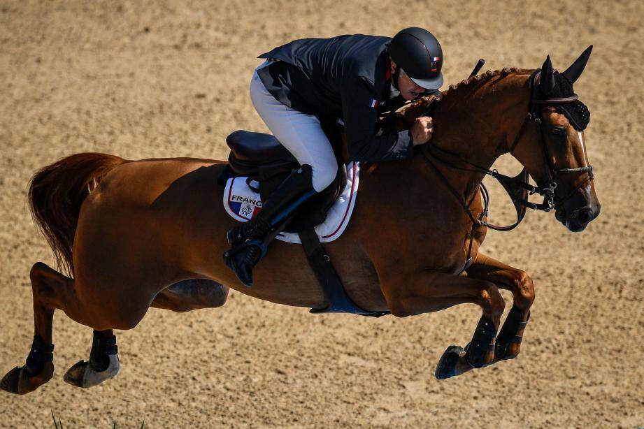 France's horseman Roger Yves Bost competes during the Rio 2016 Olympic Games at the Olympic Equestrian Centre in Rio de Janeiro, Brazil, on August 16, 2016. / AFP PHOTO / PHILIPPE LOPEZ EQUESTRIAN-OLY-2016-RIO