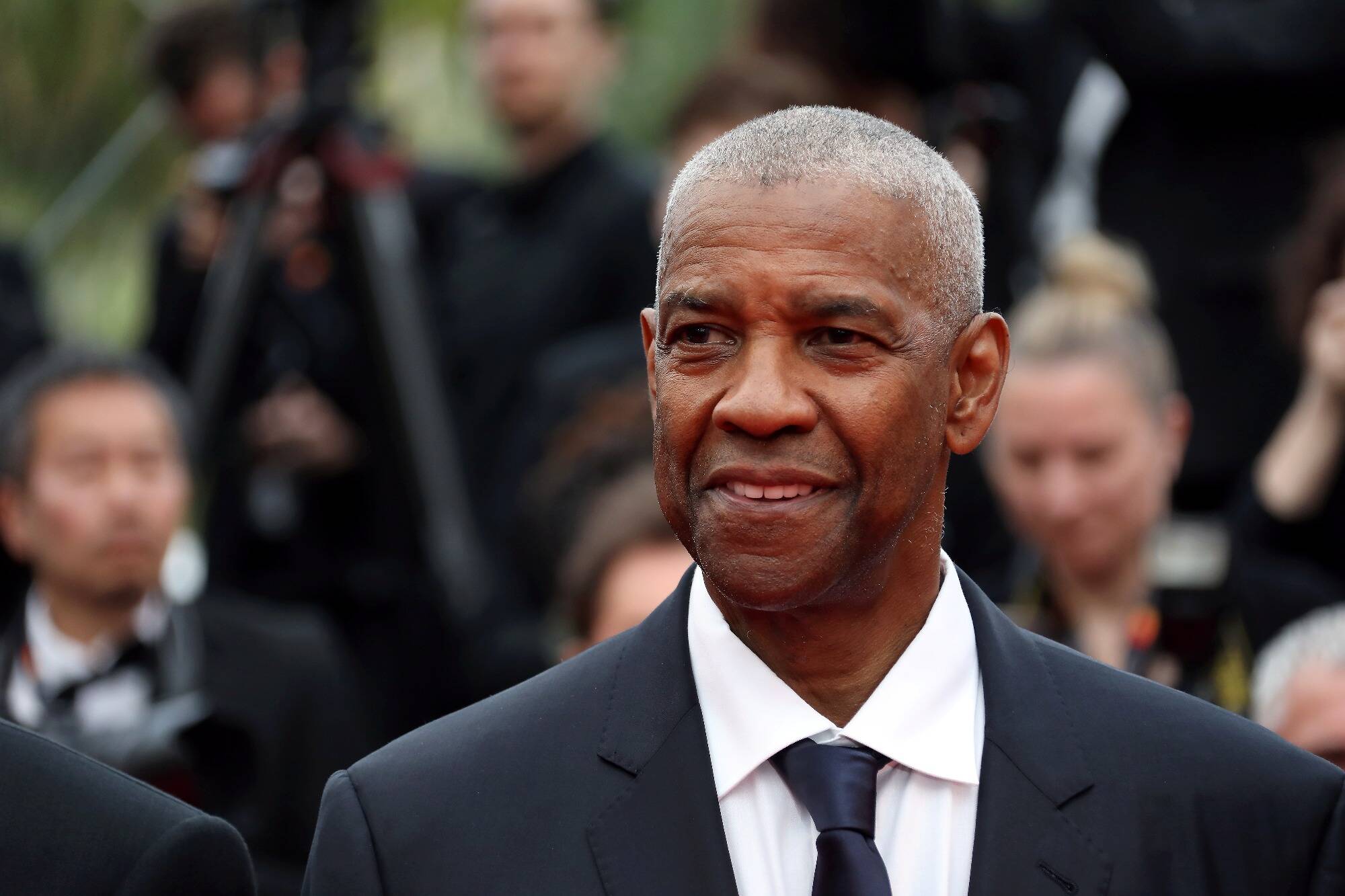 78e Festival de Cannes: l'acteur Denzel Washington reçoit une Palme d'Or d'honneur surprise après sa montée des marches aux côtés de Spike Lee